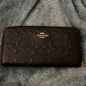 Coach black embossed signature zip around leather wallet